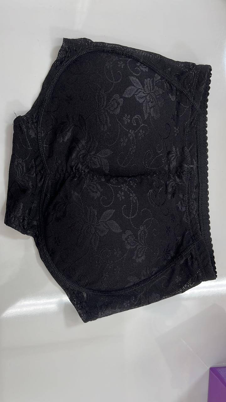 Black textured fabric with floral patterns on a white background