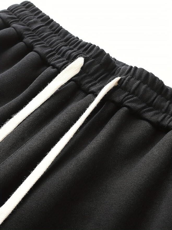 Black pants with white stripes on a white background