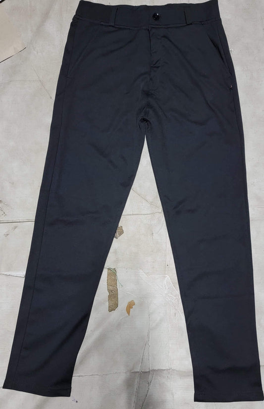 Black pants on a light gray surface