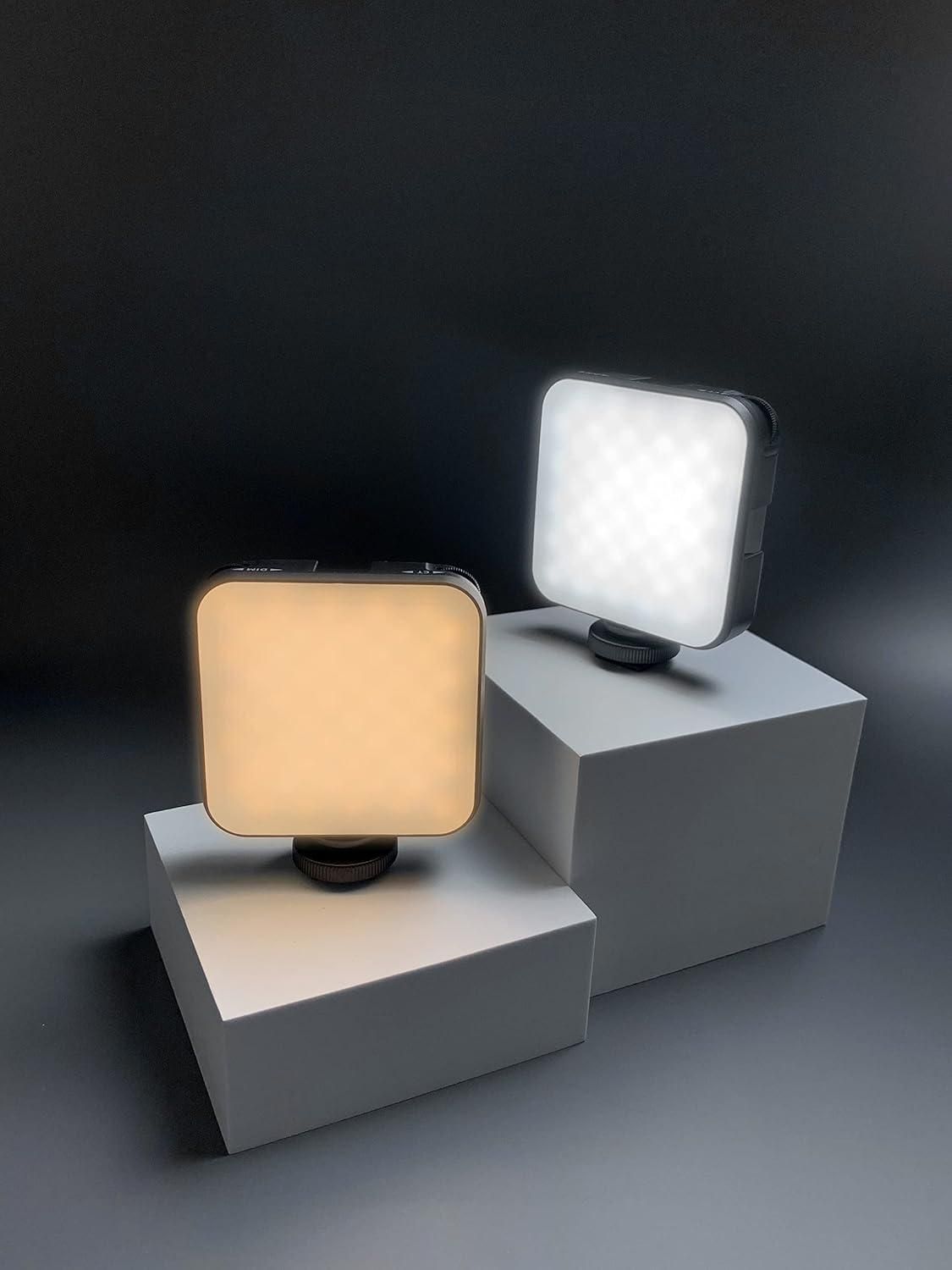 Two LED Video Light
 on gray stands against a dark background