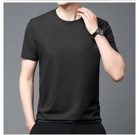 Men's slim fit black t-shirt showcasing 4-way stretch fabric, perfect for gym or casual wear.