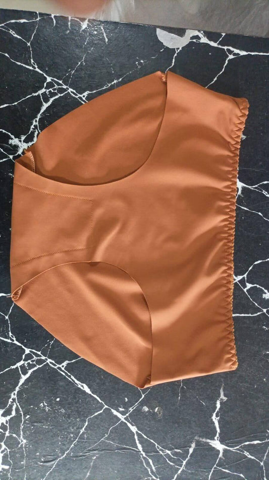 Brown Women's Seamless Underwear  top on a black marble surface