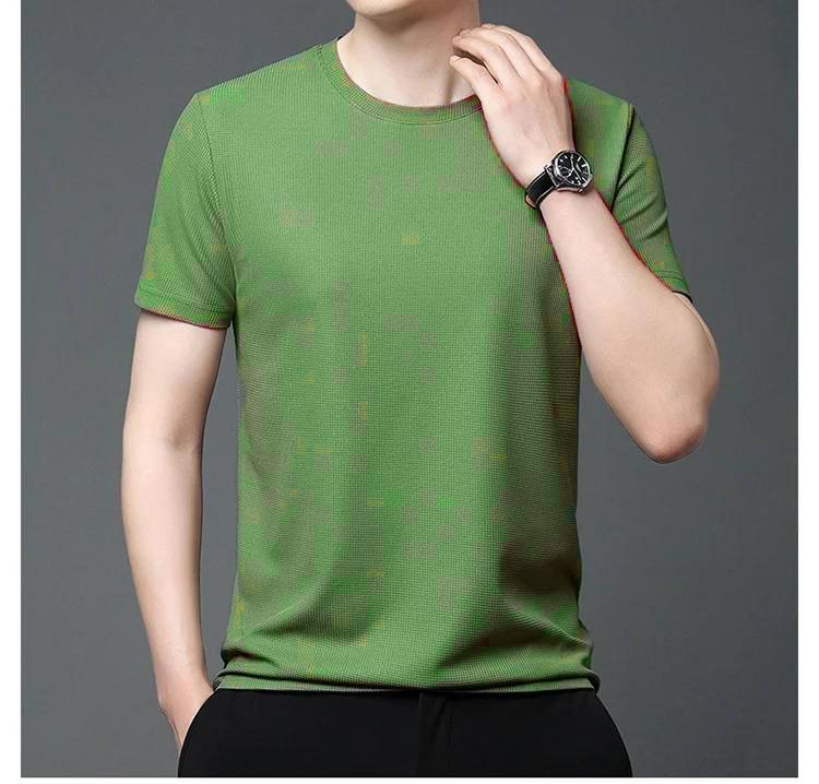 Men's green 4-way stretch slim fit T-shirt, perfect for gym and casual wear, showcasing soft fabric and modern style.